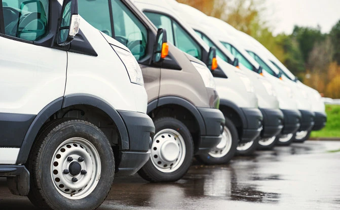 group of van parked in a diagonal way