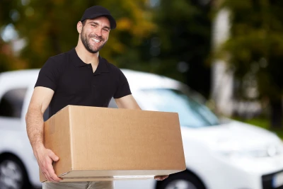 delivery man holding a paper box