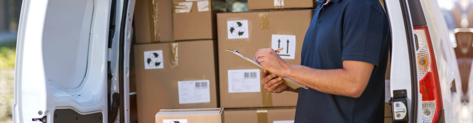 delivery boy writing on a cardboard concept